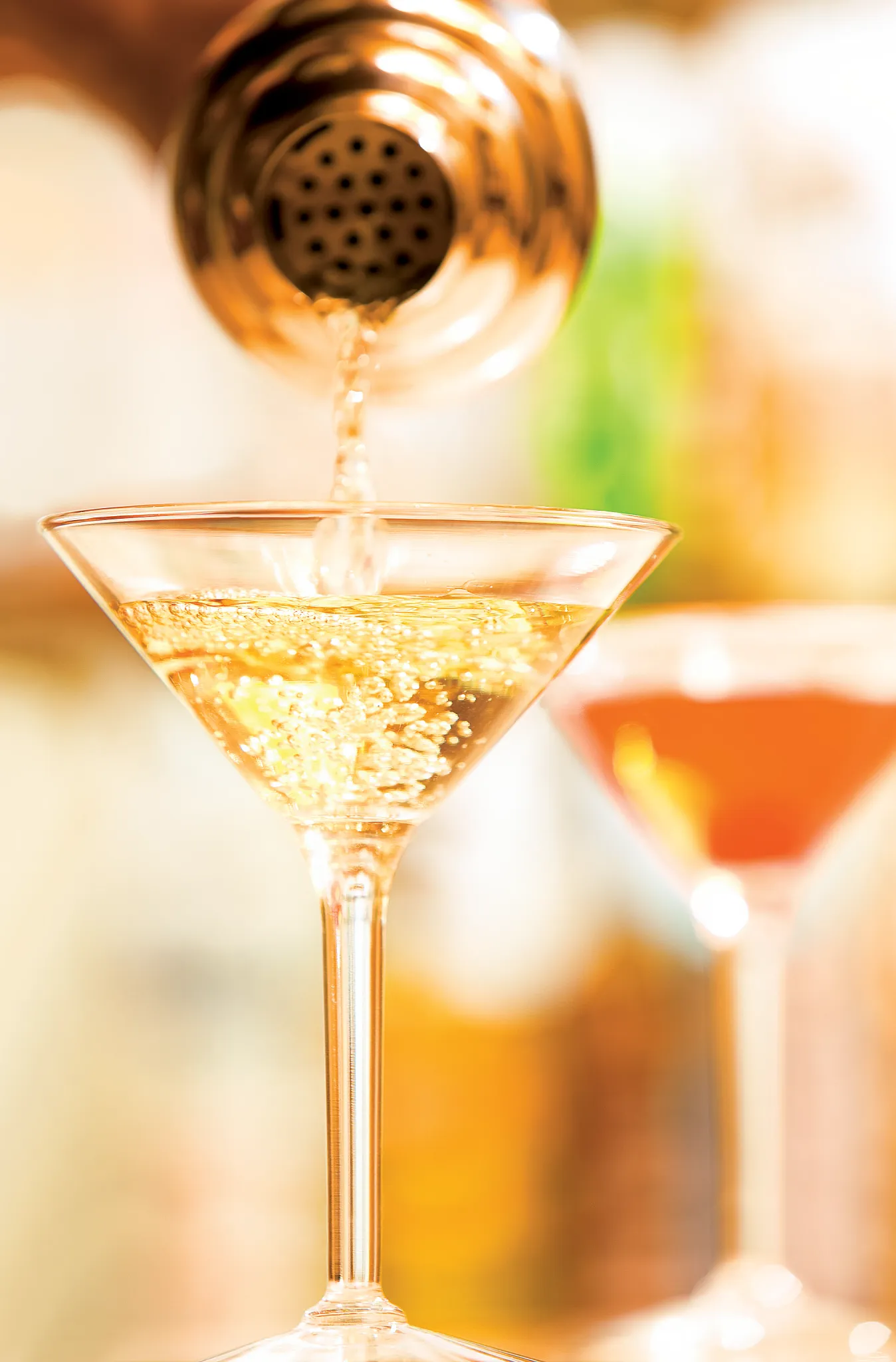 Cocktail being poured into a martini glass at Starlight Music Lounge at Sunscape Dorado Pacifico Ixtapa.