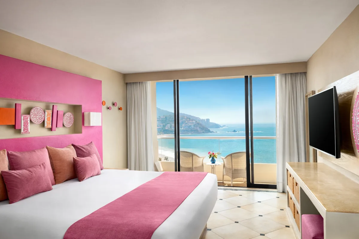 Sun Club Deluxe Ocean View king room with private balcony overlooking Bahia del Palmar at Sunscape Dorado Pacifico Ixtapa.