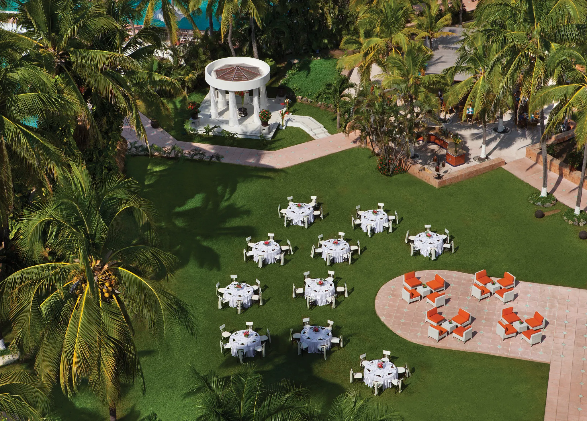 Tropical wedding garden reception setup at Sunscape Dorado Pacifico Ixtapa